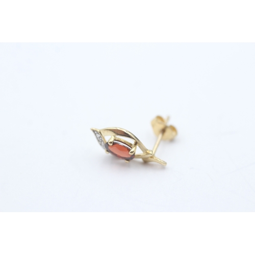 115 - 9ct gold garnet & diamond stud earrings (1.4g)