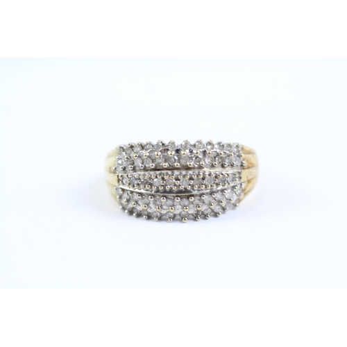 118 - 9ct gold claw set diamond dress ring (3g) Size P