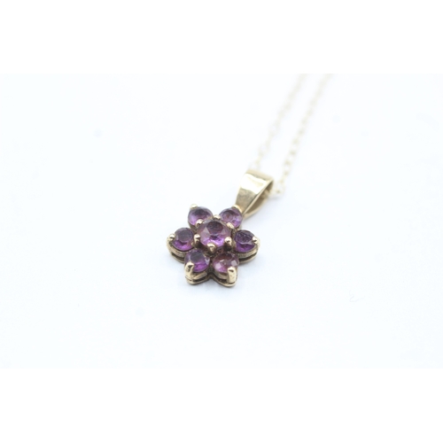 122 - 9ct gold amethyst floral pendant on chain (1.2g)