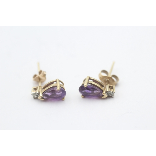 124 - 9t gold amethyst & diamond stud earrings (1.5g)