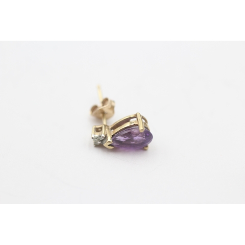 124 - 9t gold amethyst & diamond stud earrings (1.5g)