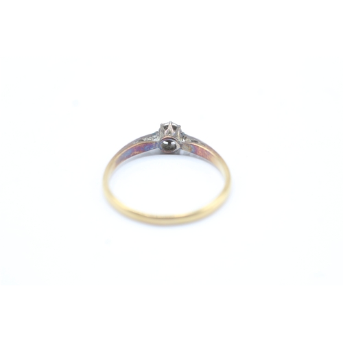 129 - 18ct gold and diamond set ring (1.9g) Size Q