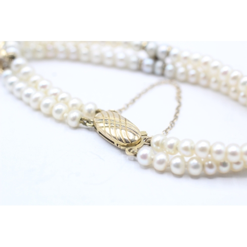 130 - 9ct gold cultured pearl and diamond bracelet (12.1g)