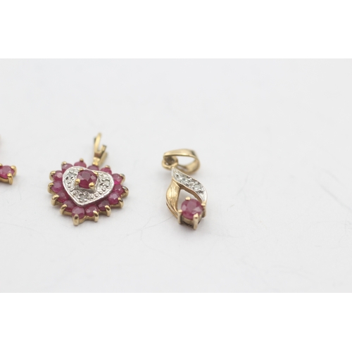 133 - 3 x 9ct gold ruby and diamond pendants (2.2g)