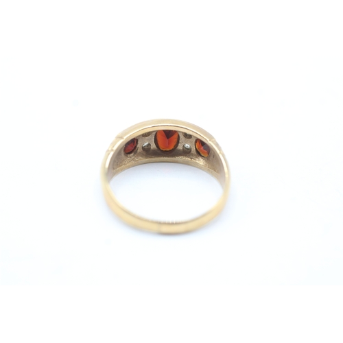 149 - 9ct gold garnet & diamond dress ring (4.4g) Size S