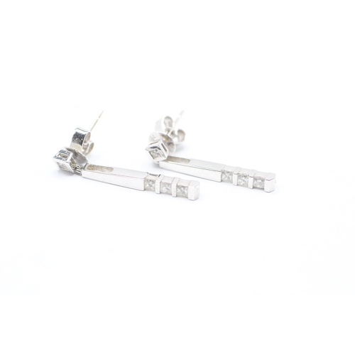 169 - 18ct white gold diamond bar drop earrings (3.3g)