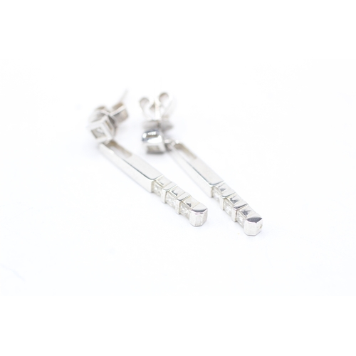 169 - 18ct white gold diamond bar drop earrings (3.3g)