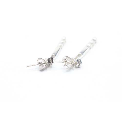 169 - 18ct white gold diamond bar drop earrings (3.3g)