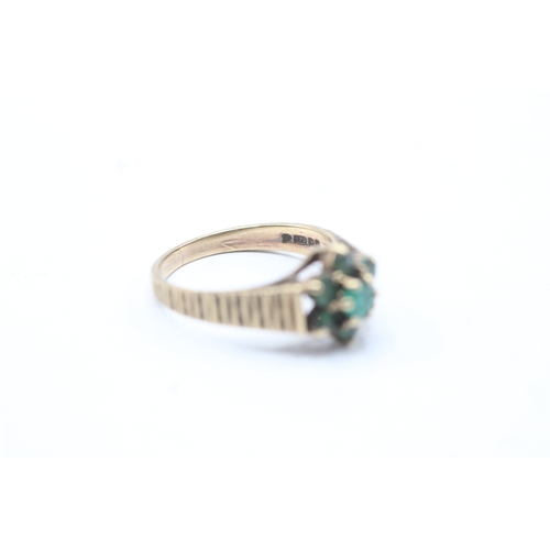 172 - 9ct gold emerald floral ring (2.5g) Size N