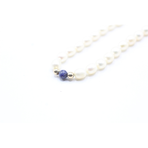 175 - 14ct gold clasped cultured pearl and lapis lazuli beaded necklace (12.2g)