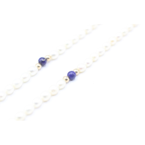 175 - 14ct gold clasped cultured pearl and lapis lazuli beaded necklace (12.2g)