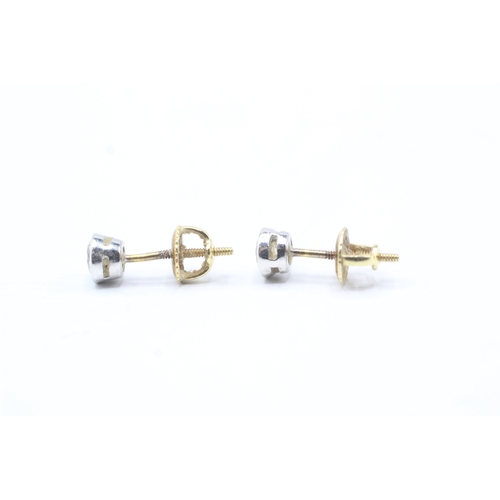 184 - 18ct gold diamond stud earrings (1.4g)