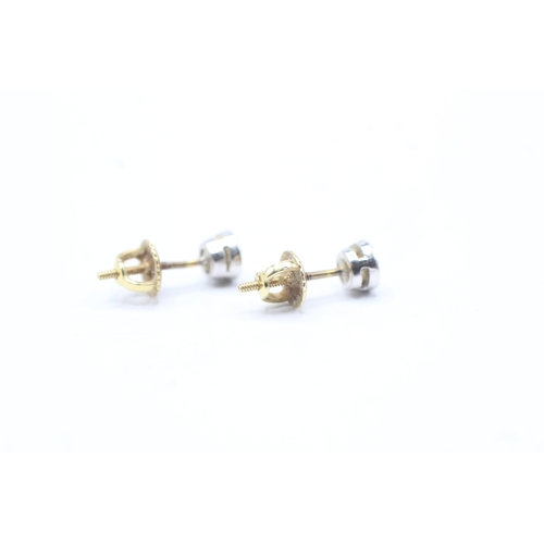 184 - 18ct gold diamond stud earrings (1.4g)