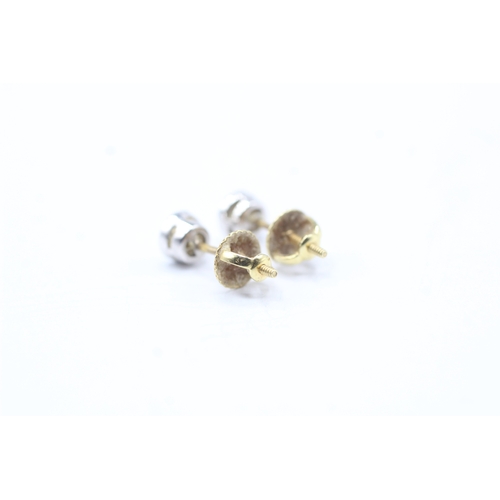 184 - 18ct gold diamond stud earrings (1.4g)