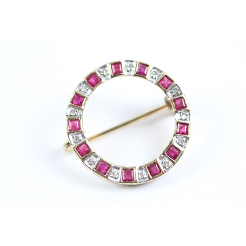 186 - 9ct gold ruby & diamond circular brooch (3g)