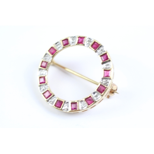 186 - 9ct gold ruby & diamond circular brooch (3g)