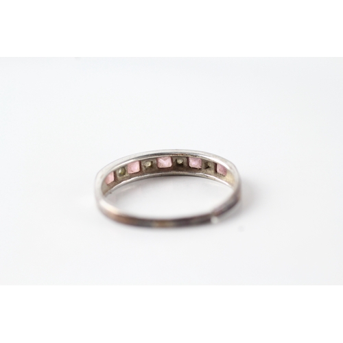 19 - 9ct white gold pink sapphire and diamond half eternity dress ring (1.7g) Size O