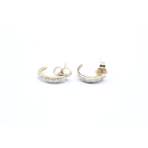 198 - 9ct gold curved diamond stud earrings (0.8g)