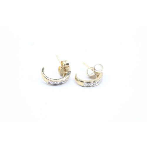 198 - 9ct gold curved diamond stud earrings (0.8g)