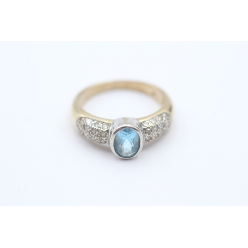 203 - 9ct gold blue gemstone & diamond dress ring (3.3g) Size N