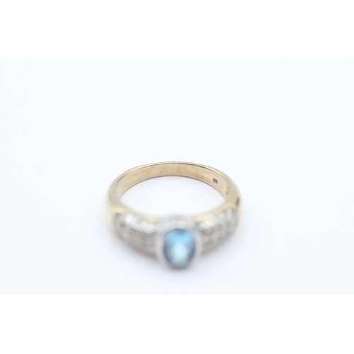 203 - 9ct gold blue gemstone & diamond dress ring (3.3g) Size N