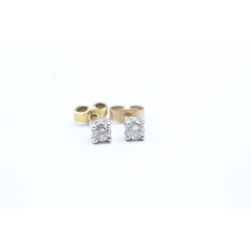 205 - 9ct gold diamond stud earrings (1g)