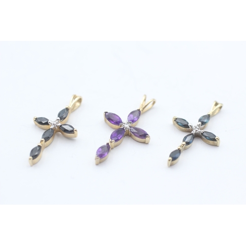 21 - 3x 9ct gold multi-gemstone cross pendants including sapphire & diamond (3.4g)