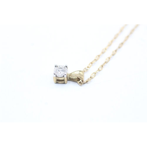 214 - 9ct gold diamond solitaire pendant necklace (1.9g)