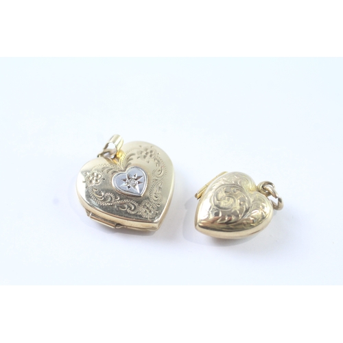 216 - 2x 9ct gold diamond heart shape locket pendants (3.7g)