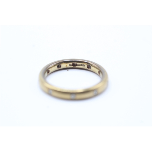 217 - 18ct gold diamond eternity ring (4.1g) Size K