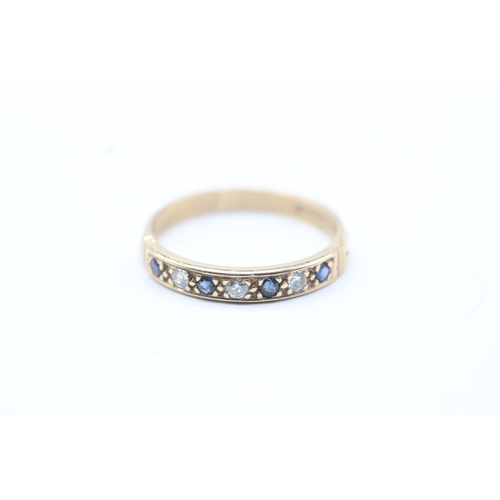 218 - 9ct gold diamond and sapphire row ring (2.3g) Size Q