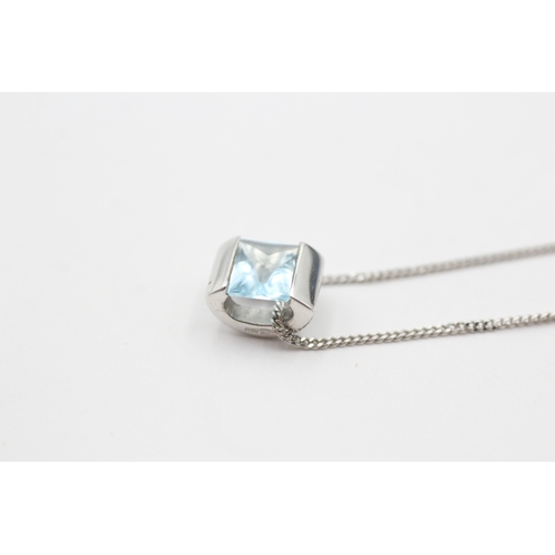 220 - 9ct gold blue gemstone pendant on chain (2.5g)