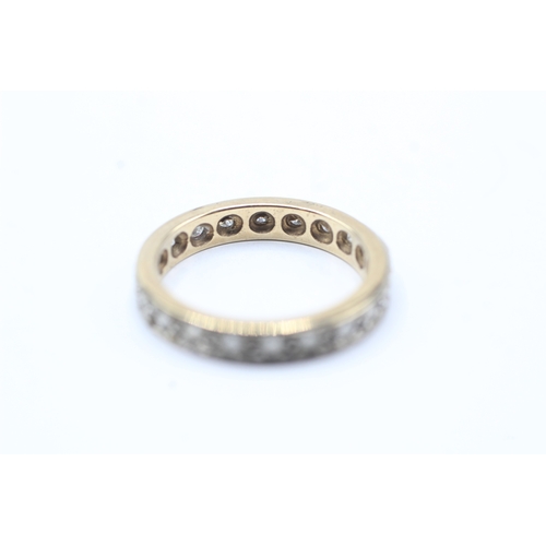 225 - 9ct gold diamond eternity ring (2.7g) Size L