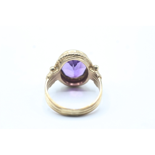 226 - 9ct gold amethyst single stone ring (4.8g) Size L