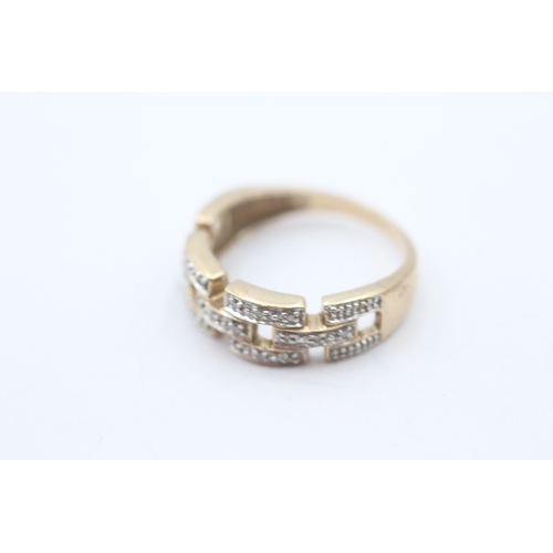 232 - 9ct gold diamond dress ring (3.5g) Size P