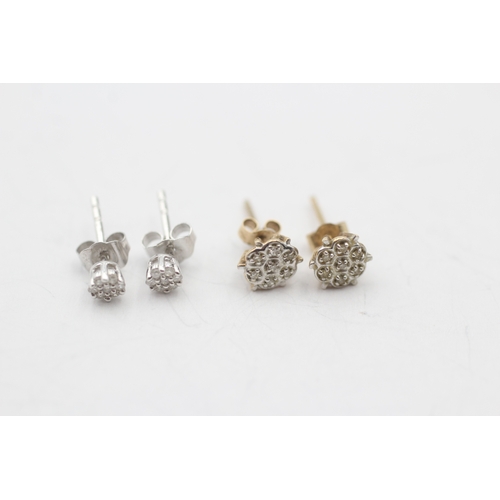 243 - 2 x 9ct gold diamond cluster stud earrings (1.2g)