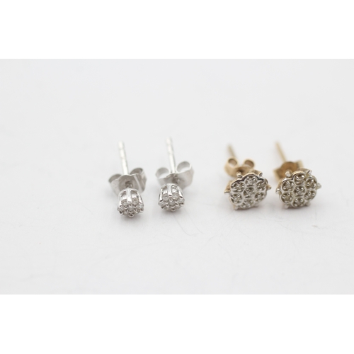 243 - 2 x 9ct gold diamond cluster stud earrings (1.2g)