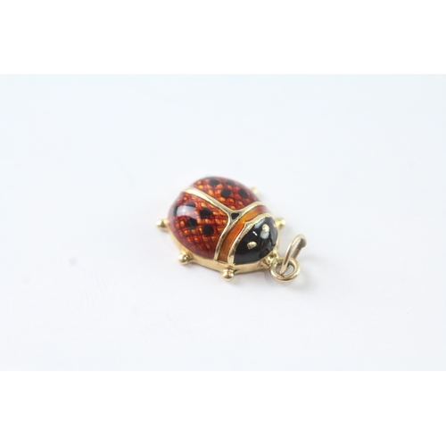 244 - 9ct gold enamel ladybird charm (1.1g)