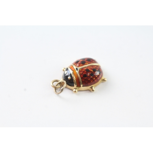 244 - 9ct gold enamel ladybird charm (1.1g)