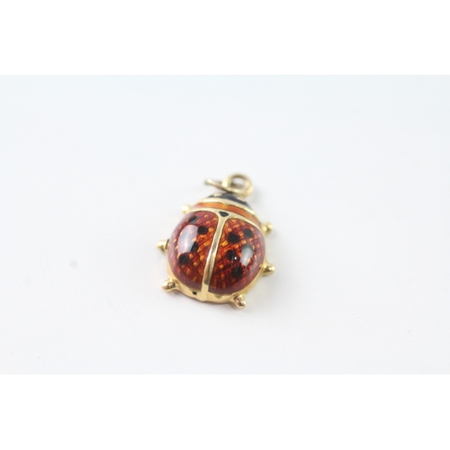 244 - 9ct gold enamel ladybird charm (1.1g)