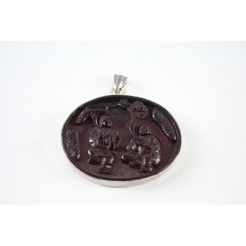 278 - Sterling Silver Carved Resin Pendant 23g