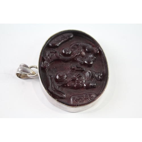 278 - Sterling Silver Carved Resin Pendant 23g