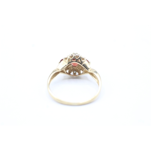 52 - 9ct gold diamond and red gemstone halo ring (2g) Size P