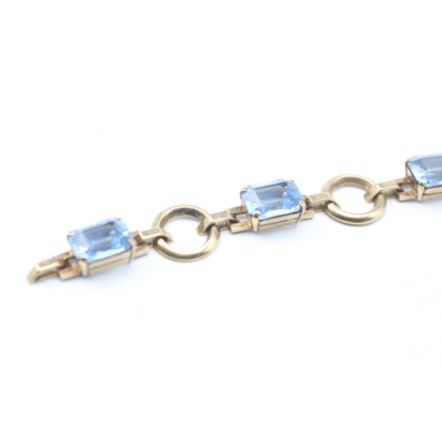 58 - 9ct gold blue gemstone bracelet (11.7g)