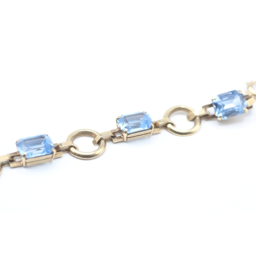 58 - 9ct gold blue gemstone bracelet (11.7g)