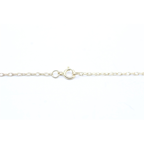 66 - 9ct gold single diamond pendant on chain (1.2g)