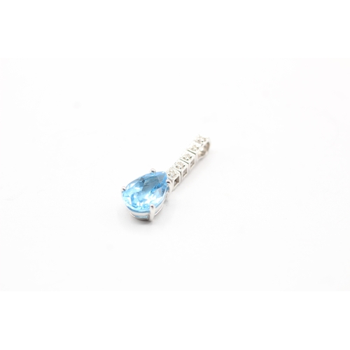 67 - 18ct white gold diamond and topaz drop pendant (2.7g)