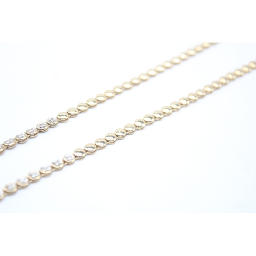 7 - 9ct gold diamond necklace (10.4g)