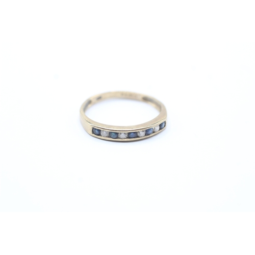 70 - 9ct gold sapphire channel ring (1.5g) Size P