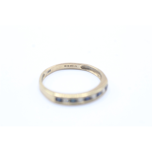 70 - 9ct gold sapphire channel ring (1.5g) Size P